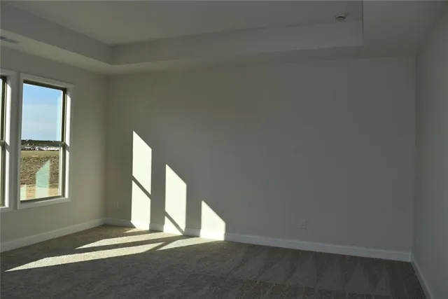 a bathroom with 2 sink shower and a mirror