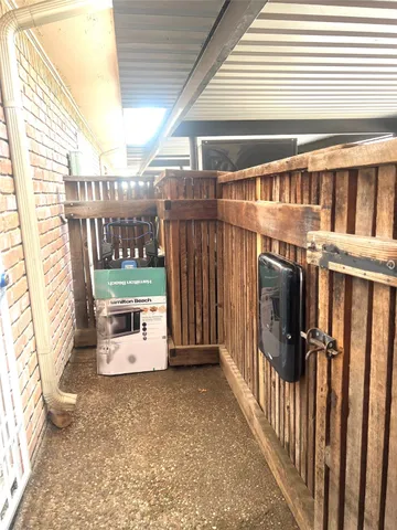 a view of a chairs and table in the balcony