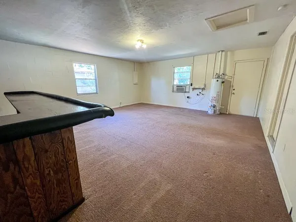 a view of a livingroom with a window
