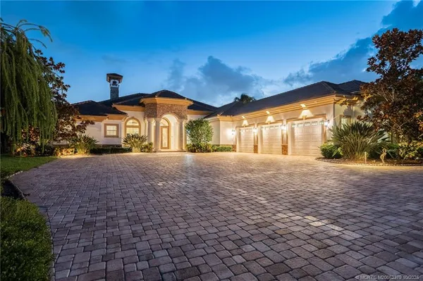 a view of a park and palm trees