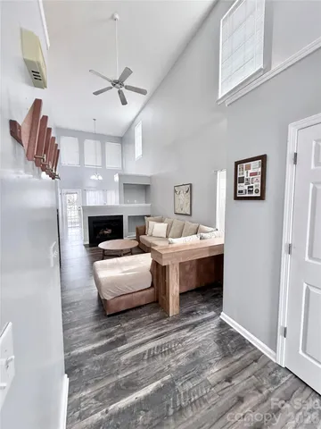 a spacious bedroom with a bed and a couch