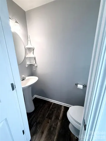 a bathroom with a sink and toilet