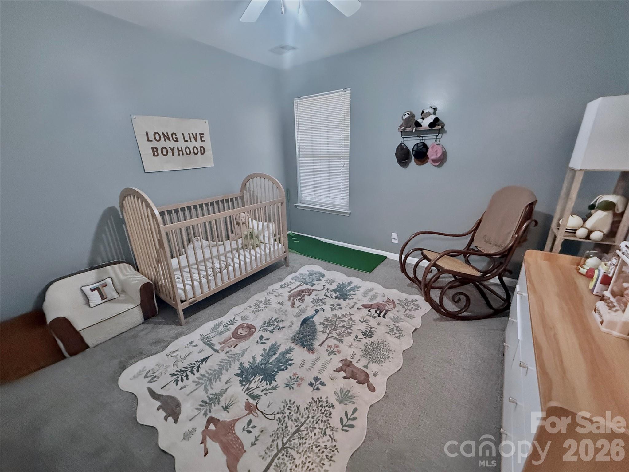 7479 Bluff Point Lane, Unit 13 Denver, NC 28037 - Photo 21 of 26 a bedroom with furniture and wooden floor