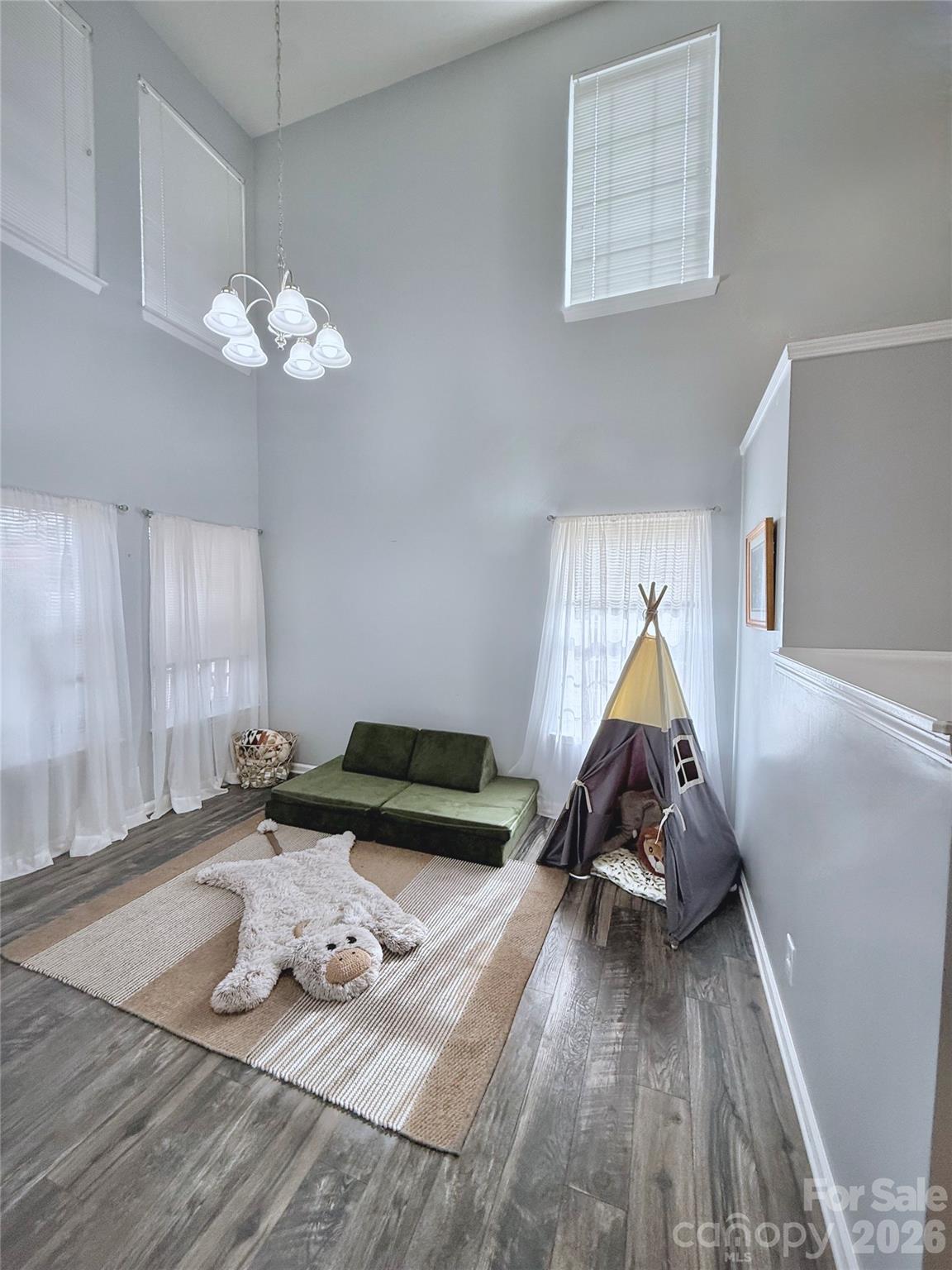 7479 Bluff Point Lane, Unit 13 Denver, NC 28037 - Photo 8 of 26 a living room with furniture and wooden floor