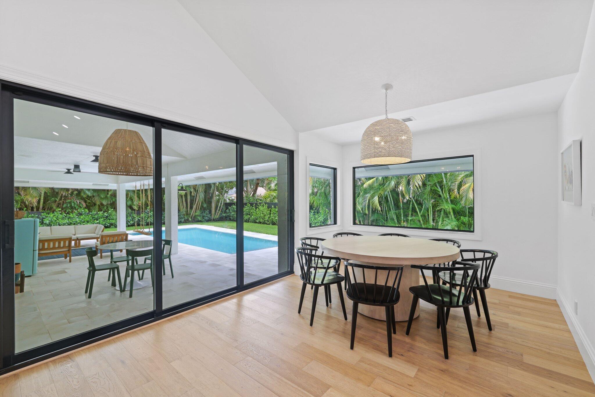 3235 Hyde Circle Boca Raton, FL 33434 - Photo 24 of 76 Kitchen table and view of pool area