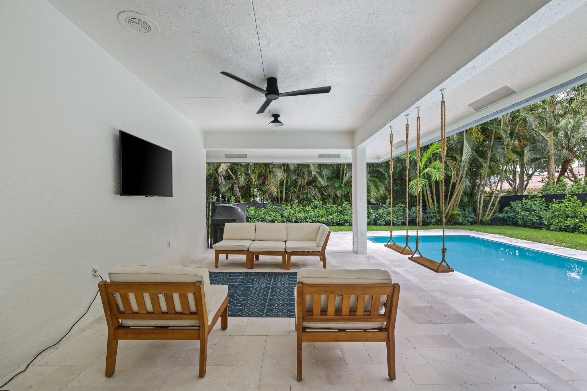 3235 Hyde Circle Boca Raton, FL 33434 - Photo 54 of 76 Pool area and covered patio