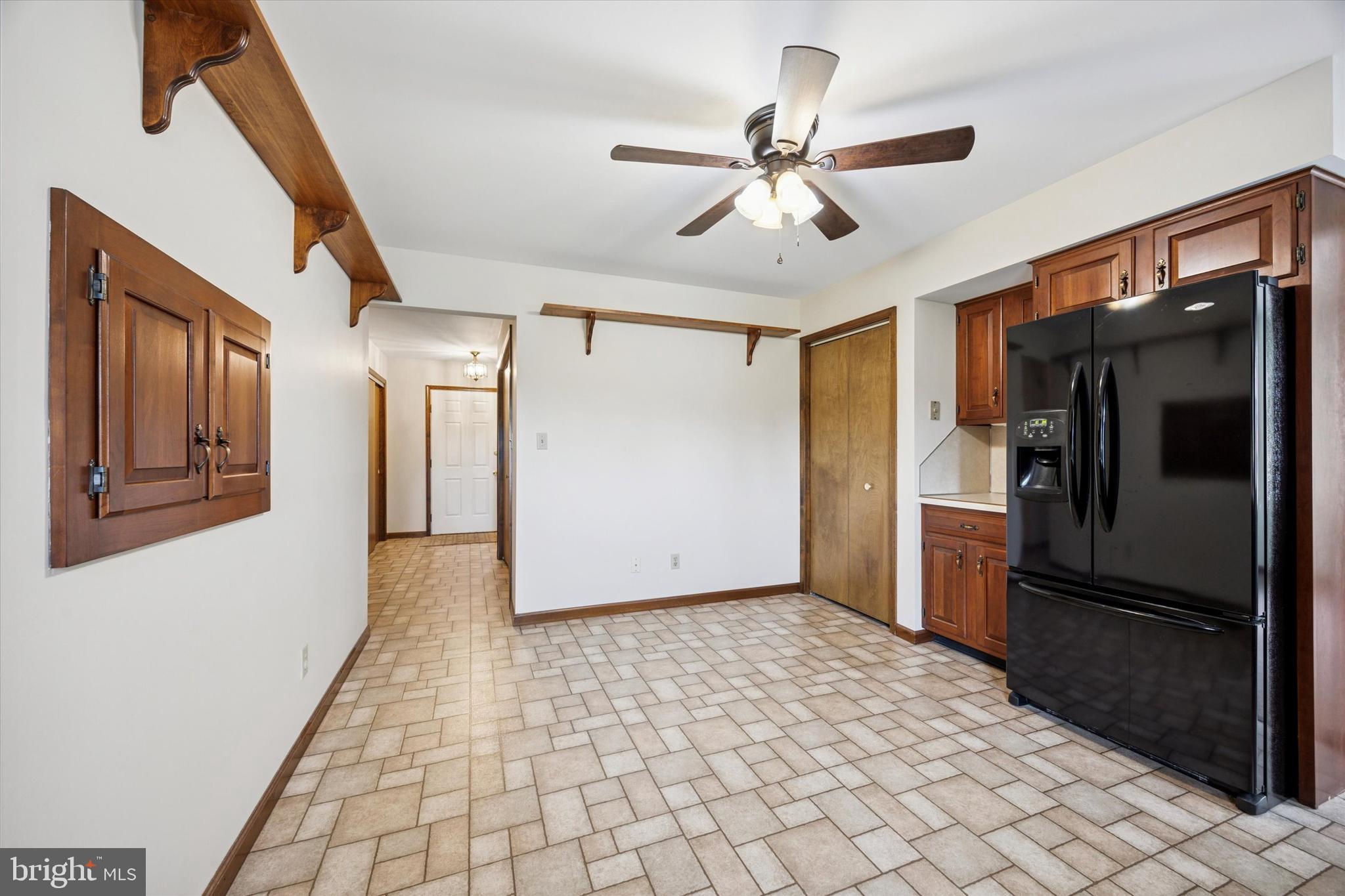 1690 Kumry Road Quakertown, PA 18951 - Photo 11 of 34 a view of a hallway with wooden floor and staircase