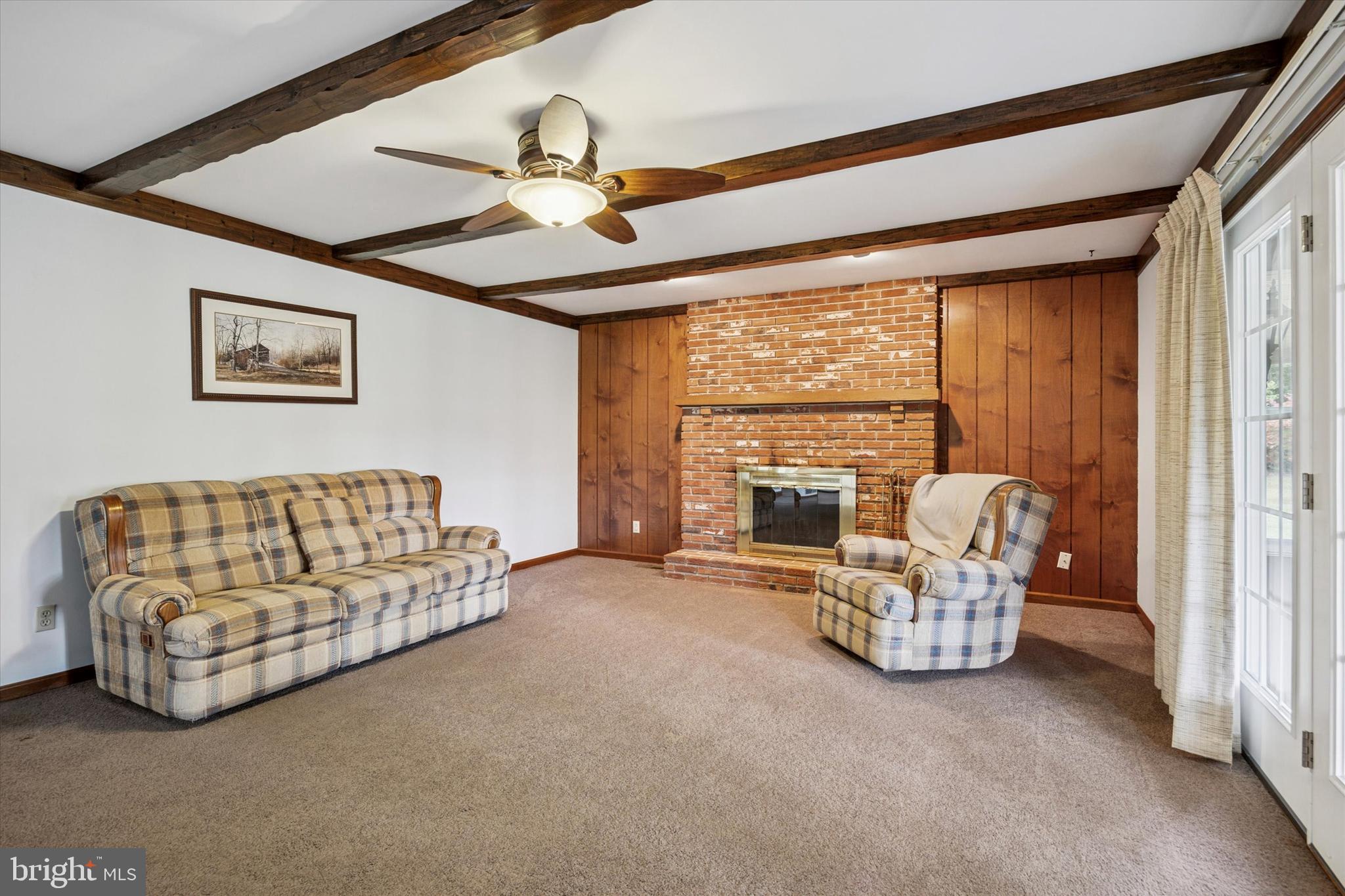 1690 Kumry Road Quakertown, PA 18951 - Photo 15 of 34 a living room with furniture and a large window