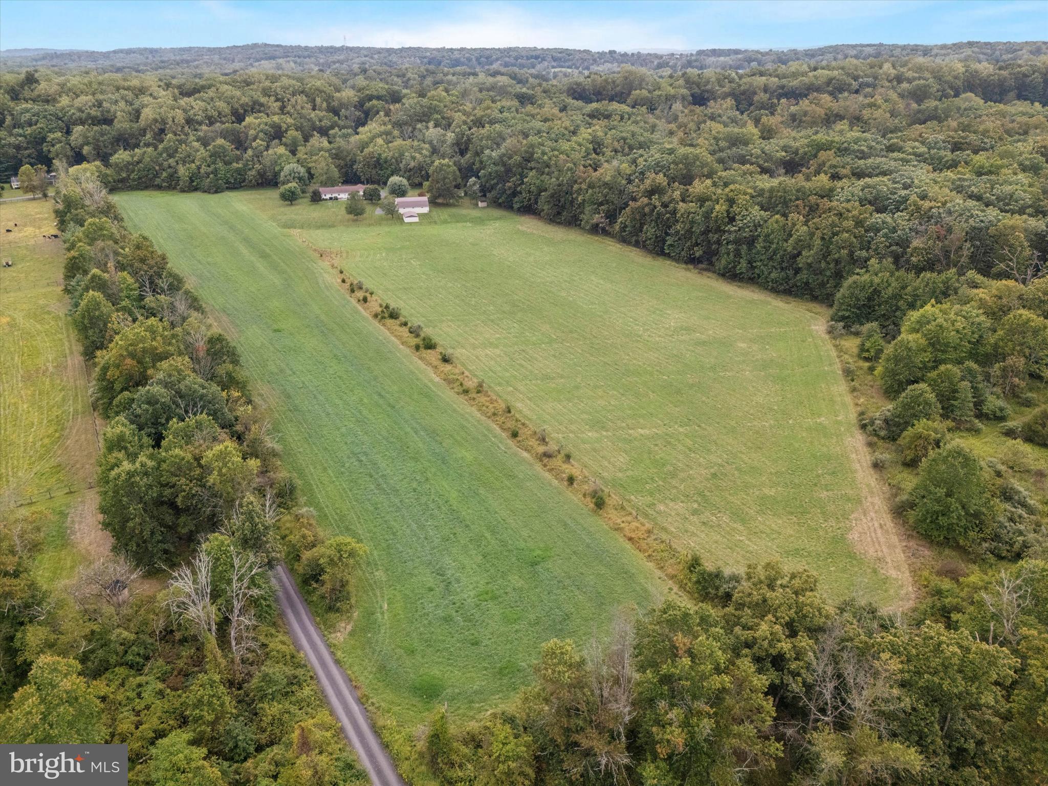 1690 Kumry Road Quakertown, PA 18951 - Photo 3 of 34 a view of a field with an ocean view