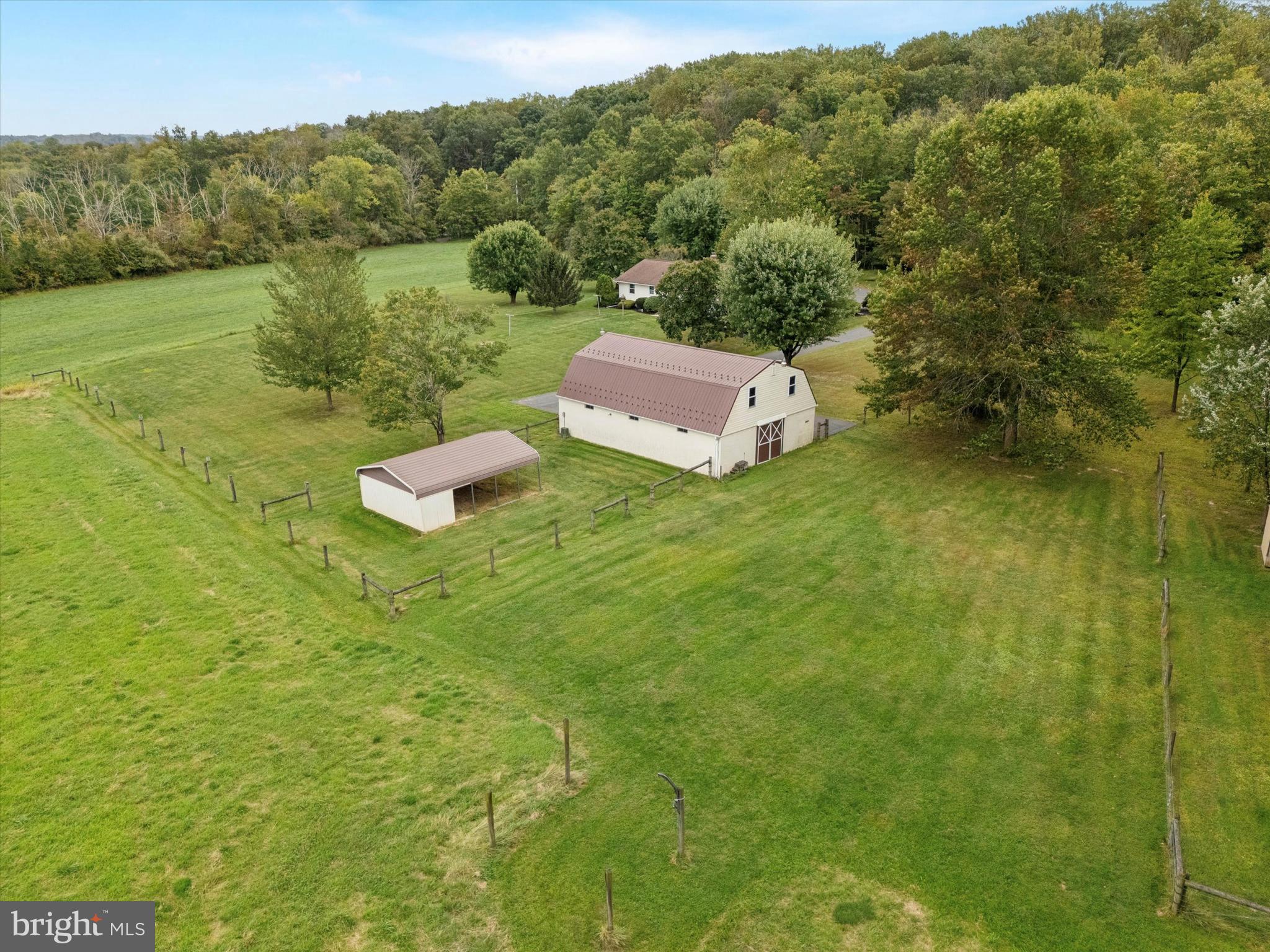 1690 Kumry Road Quakertown, PA 18951 - Photo 34 of 34 a backyard of a house with lots of green space