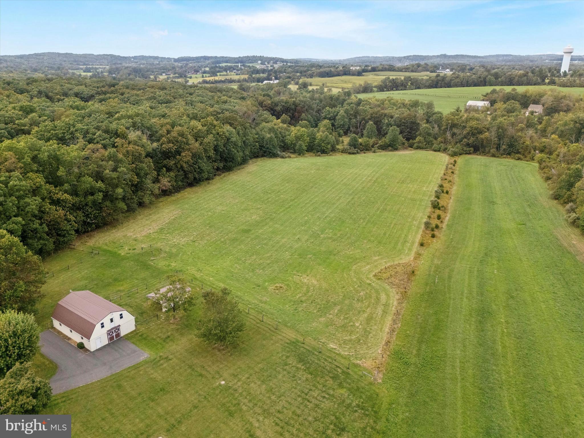 1690 Kumry Road Quakertown, PA 18951 - Photo 4 of 34 a view of a lake with a yard