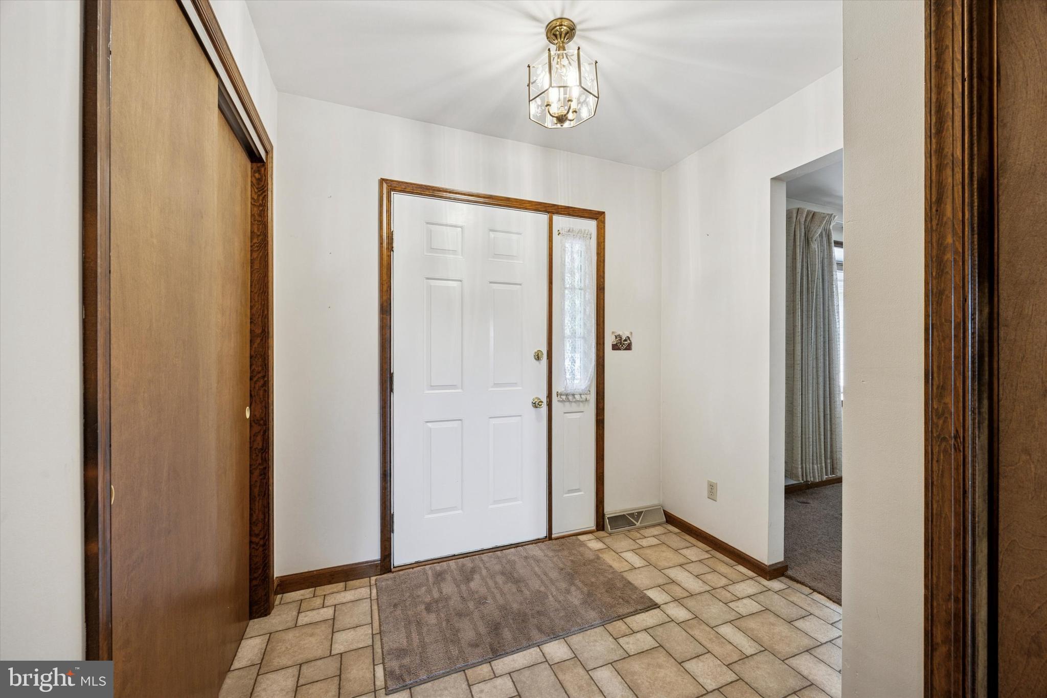 1690 Kumry Road Quakertown, PA 18951 - Photo 5 of 34 a view of a hallway with front door