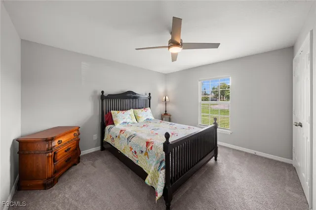 a bed room with a bed and a couch