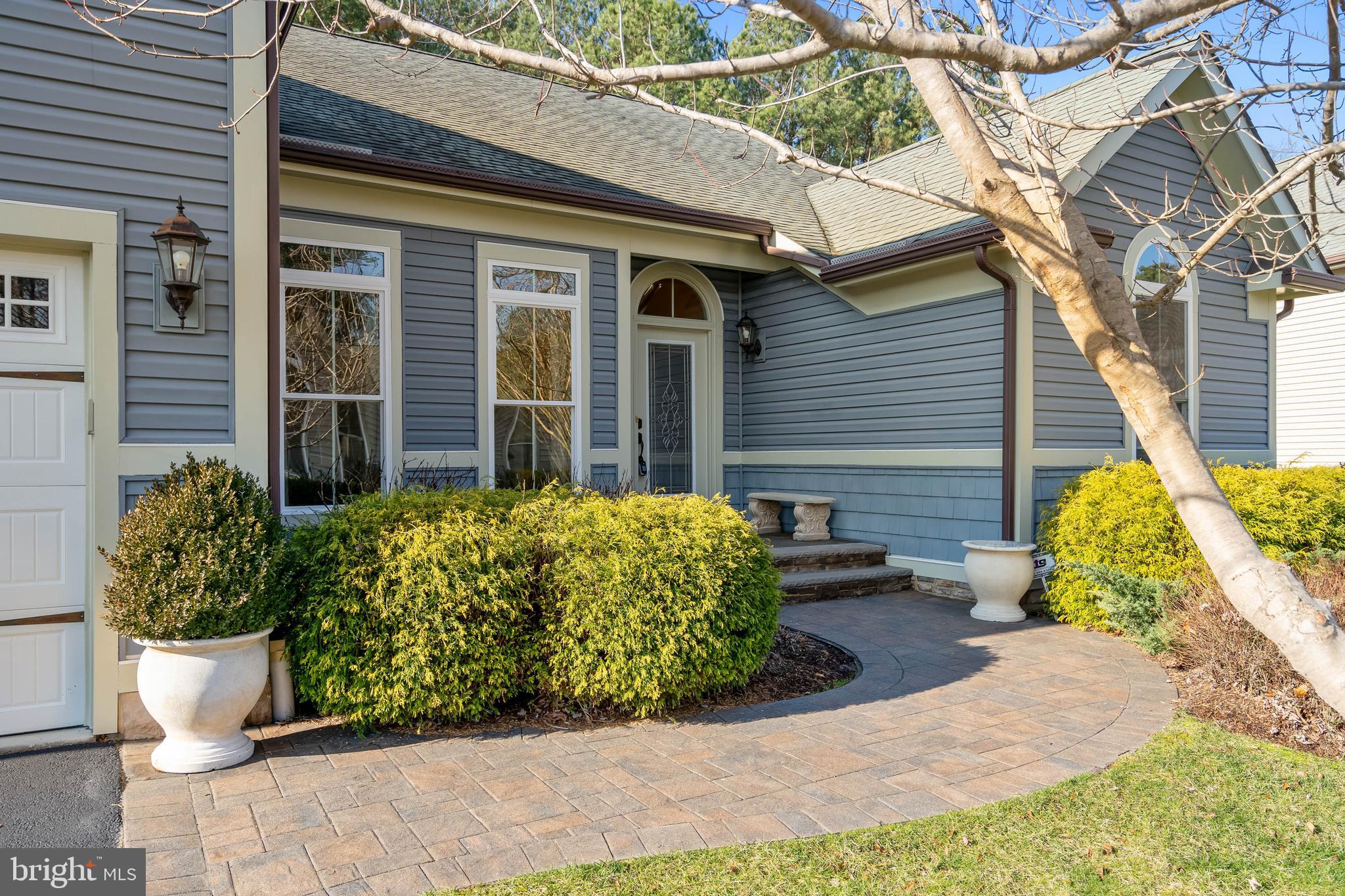 31047 Scissorbill Road Ocean View, DE 19970 - Photo 4 of 79 Beautiful Front Paver Walk to Broad Front Stoop