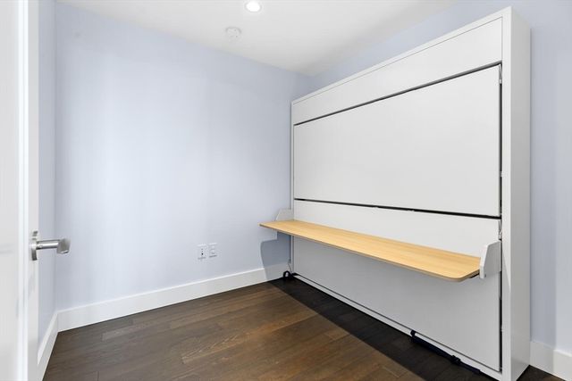 wooden floor with an outdoor view