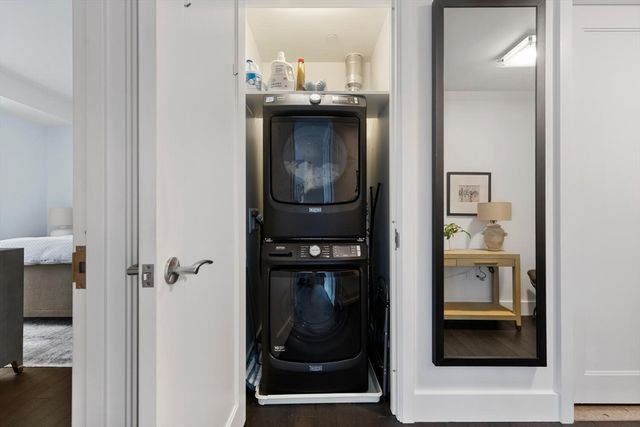 a view of room with wooden floor