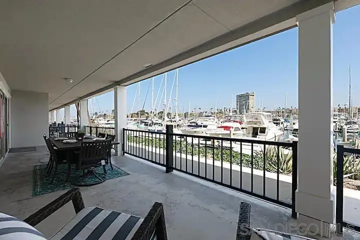1202 North Pacific Street, Unit 106B Oceanside, CA 92054 - Photo 1 of 17 a view of a balcony with chairs