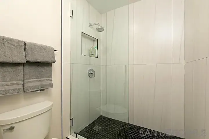 1202 North Pacific Street, Unit 106B Oceanside, CA 92054 - Photo 12 of 17 a bathroom with a shower