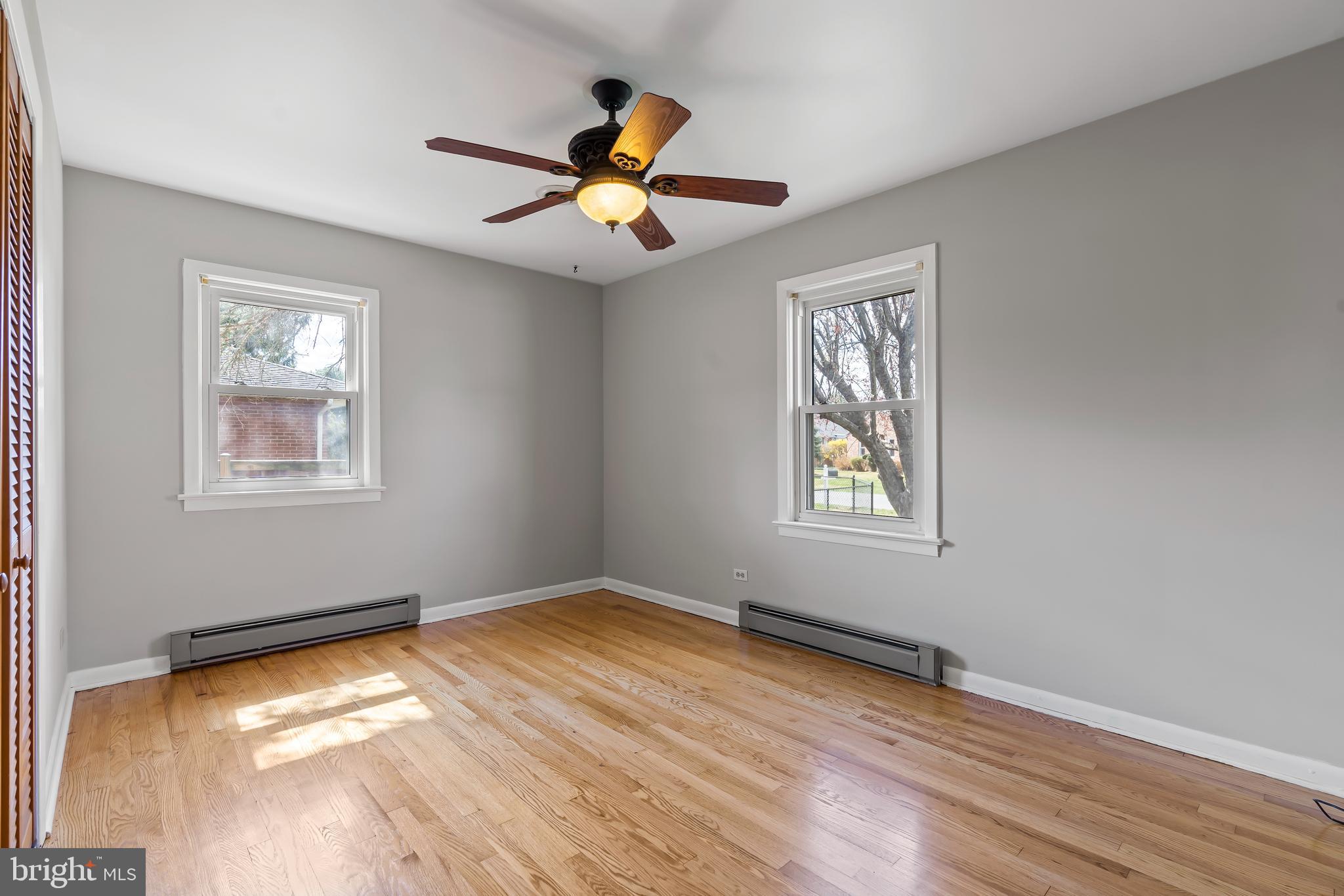 10909 Donelson Drive Williamsport, MD 21795 - Photo 17 of 37 a view of empty room with wooden floor and fan