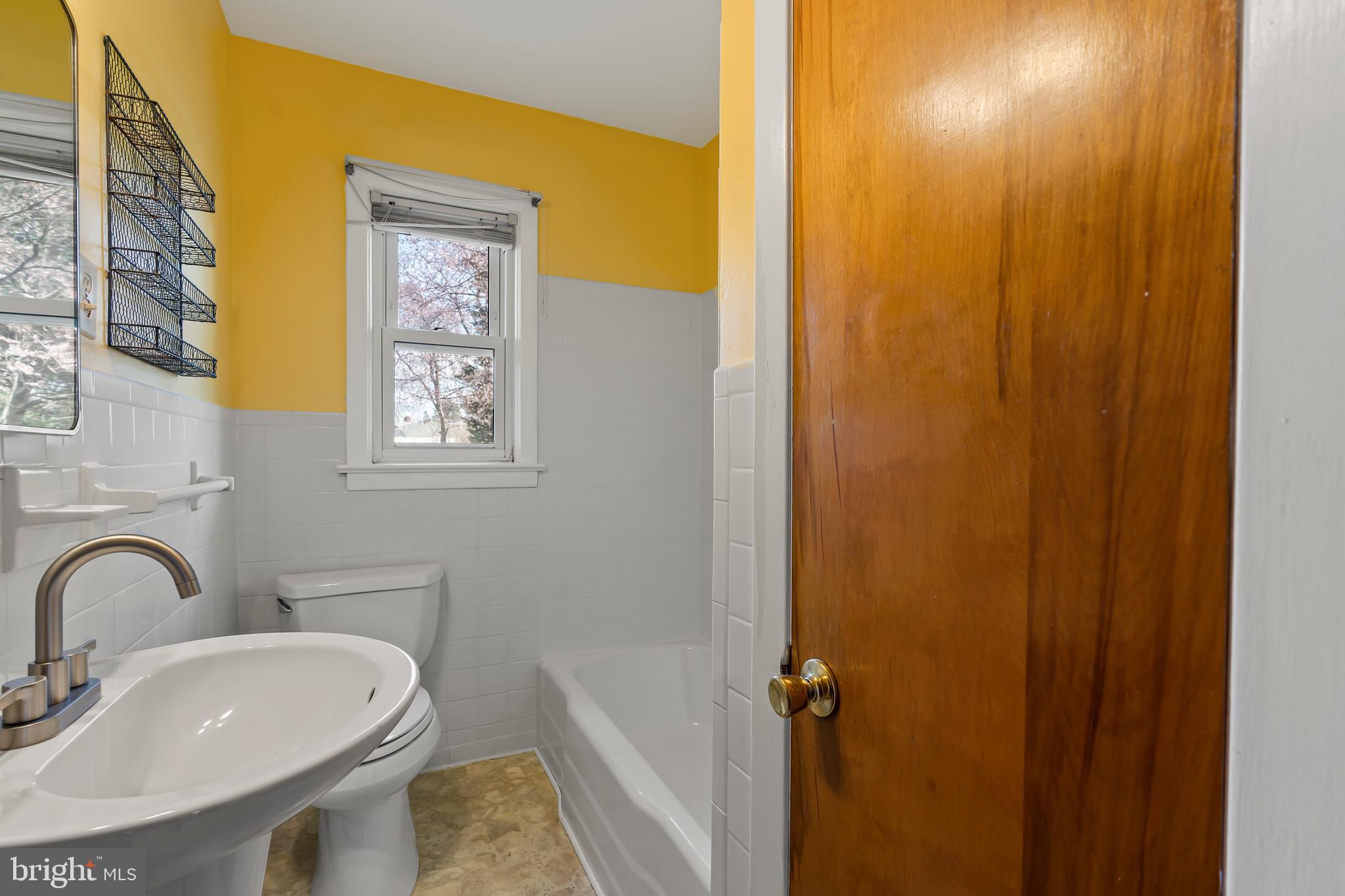10909 Donelson Drive Williamsport, MD 21795 - Photo 20 of 37 a bathroom with a sink and a mirror