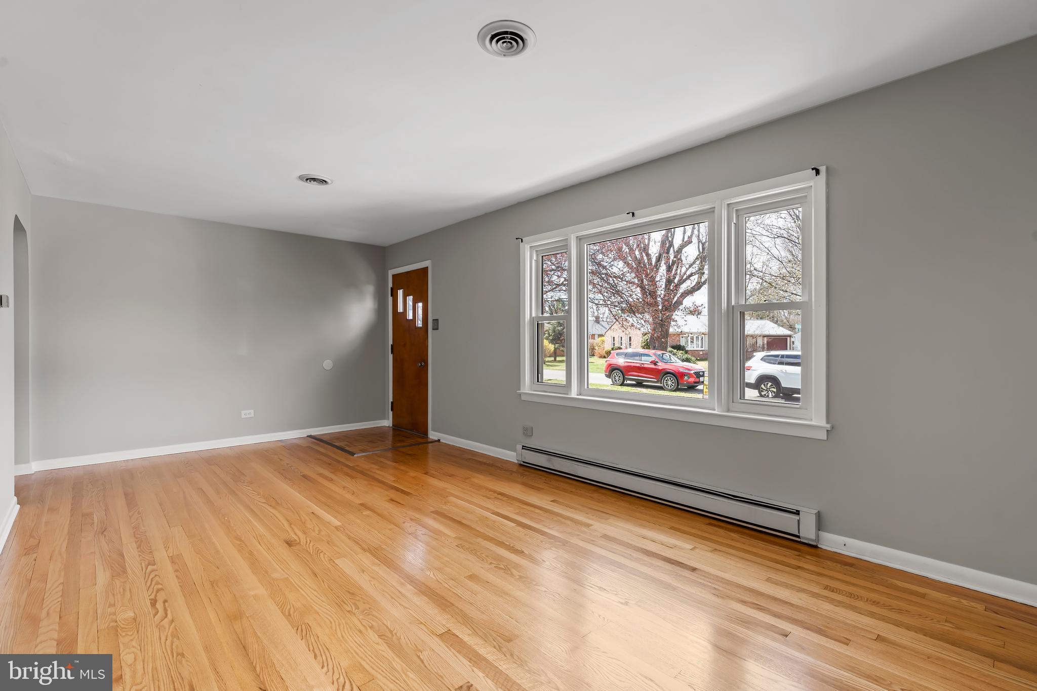 10909 Donelson Drive Williamsport, MD 21795 - Photo 6 of 37 a view of an empty room with a window