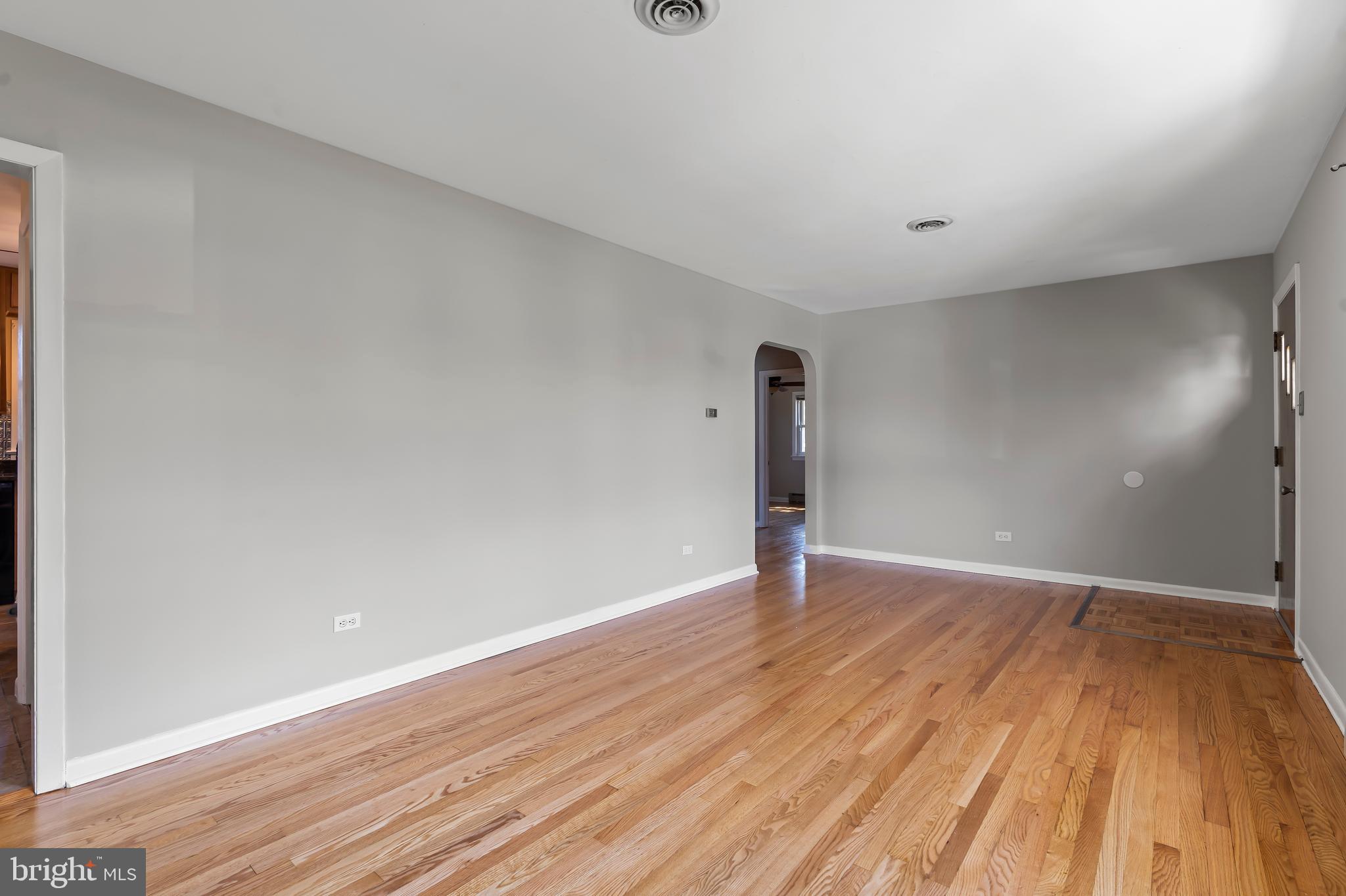 10909 Donelson Drive Williamsport, MD 21795 - Photo 9 of 37 a view of an empty room with wooden floor