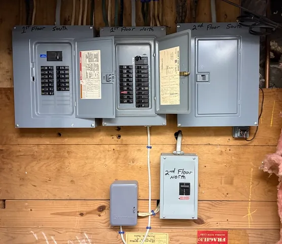 a front view of a house with outdoor seating