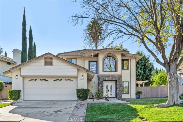 an aerial view of residential houses and outdoor space