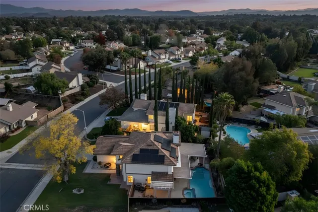 a view of a swimming pool with a patio