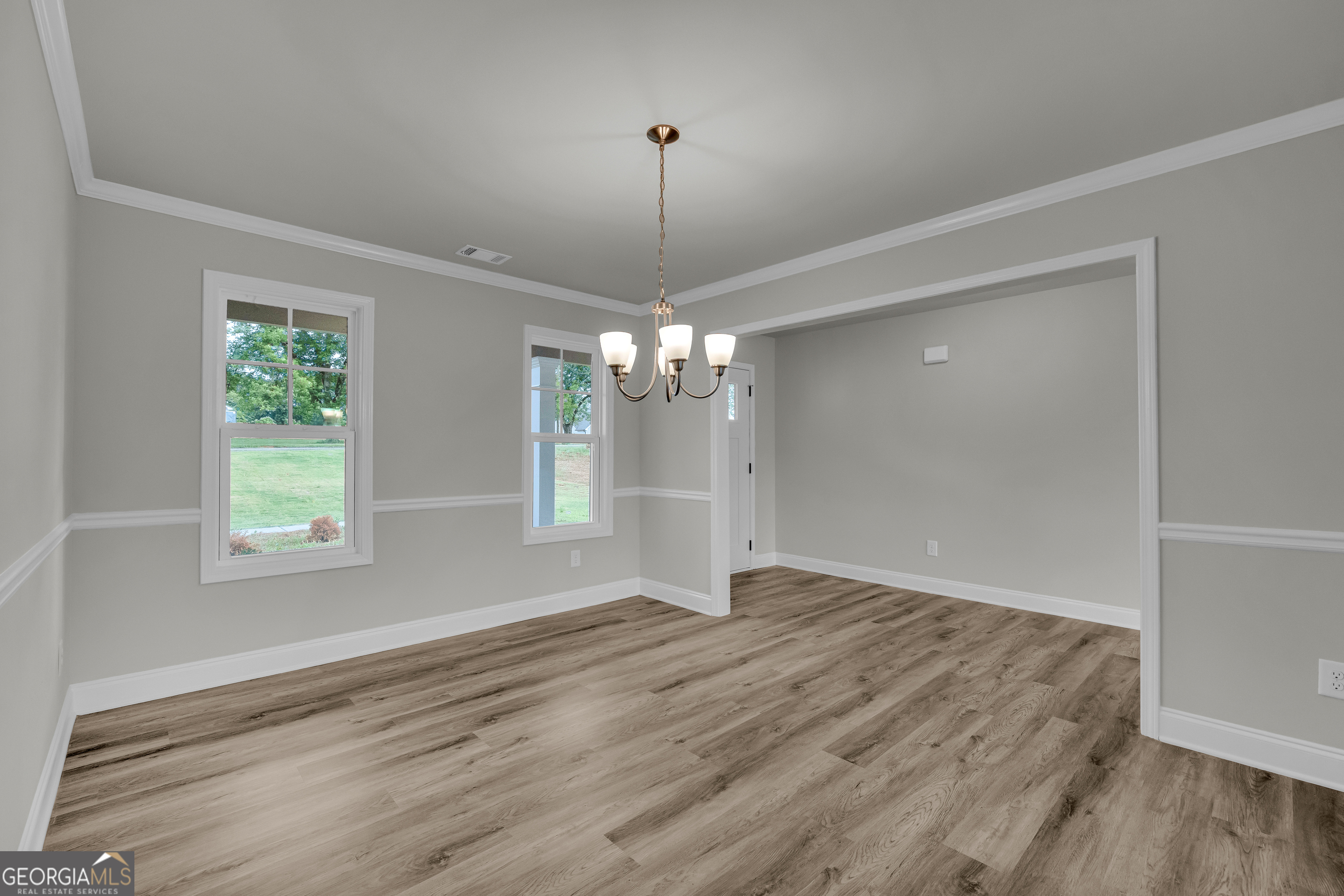 110 Sewell Road Lavonia, GA 30553 - Photo 25 of 73 wooden floor in an empty room with a window