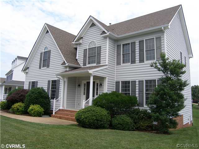 913 Biggin Pond Road Midlothian, VA 23114 - Photo 3 of 24 a view of a house with a yard and plants