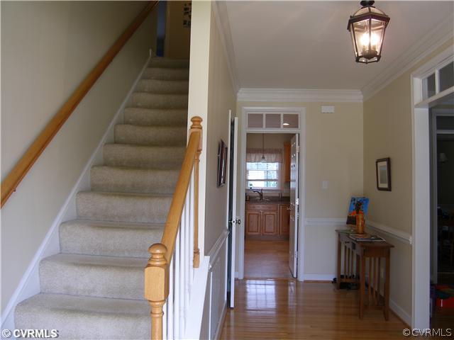 913 Biggin Pond Road Midlothian, VA 23114 - Photo 6 of 24 a view of entryway and hall with wooden floor