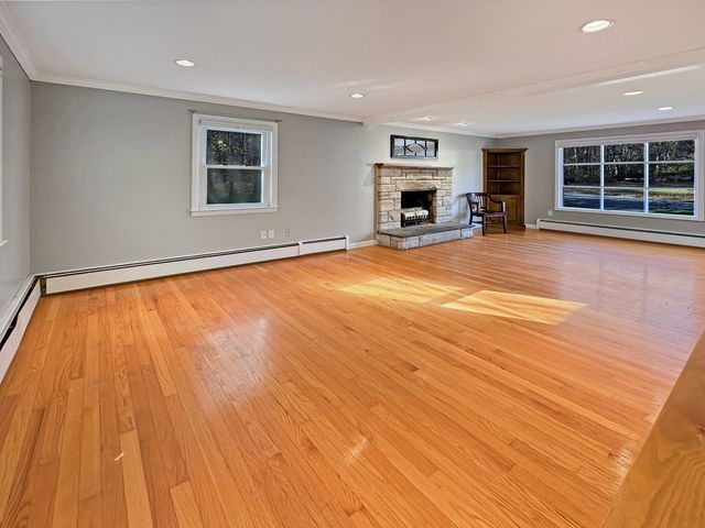 a view of a hallway with washer and dryer