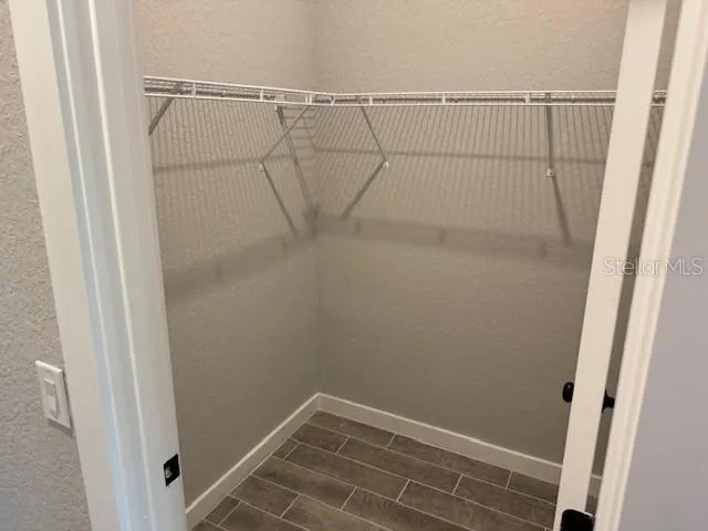 a view of a room with racks on the wall