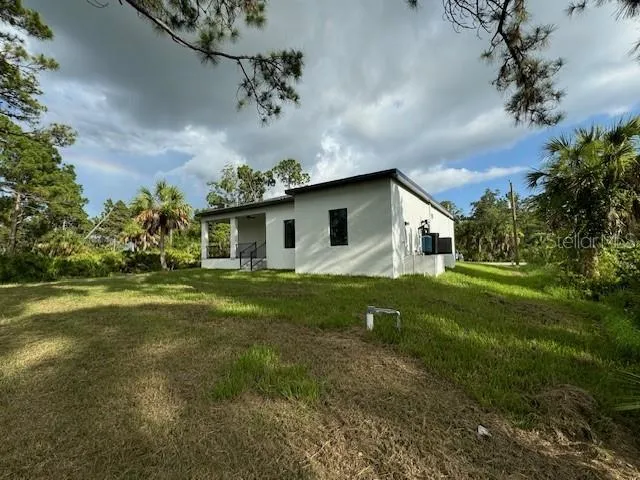 a house view with a garden space