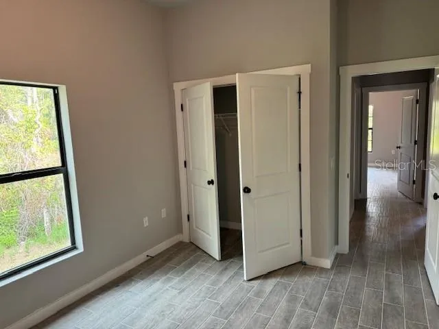 a view of livingroom with hardwood floor and window