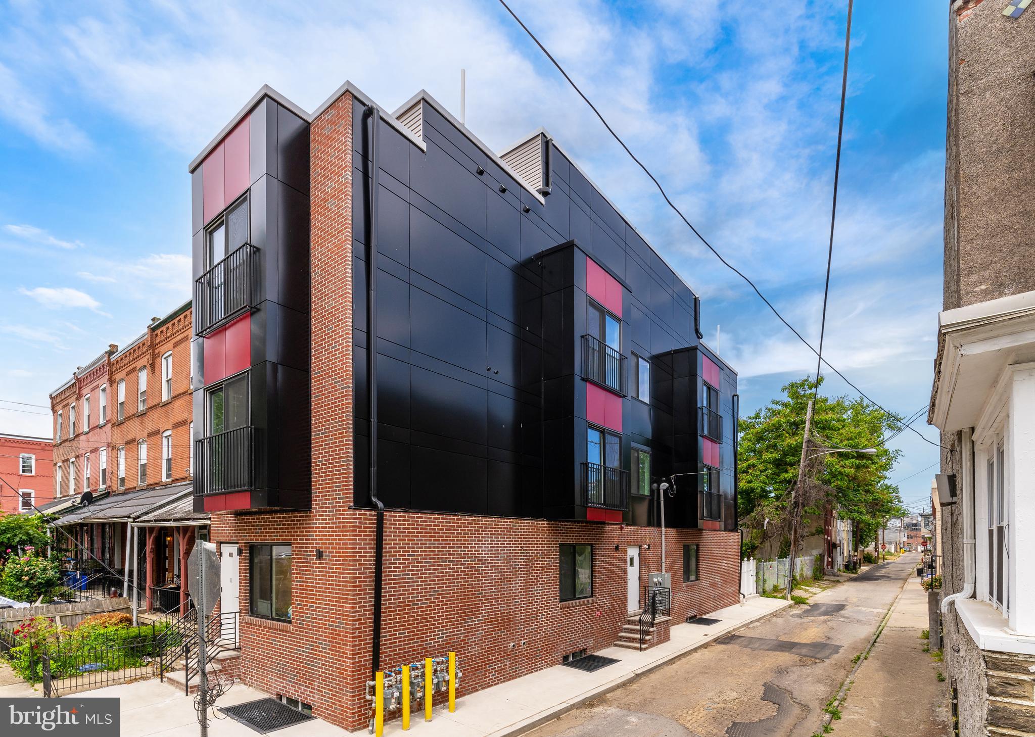 4111 Parrish Street Philadelphia, PA 19104 - Photo 2 of 38 a street sign on a sidewalk next to a building