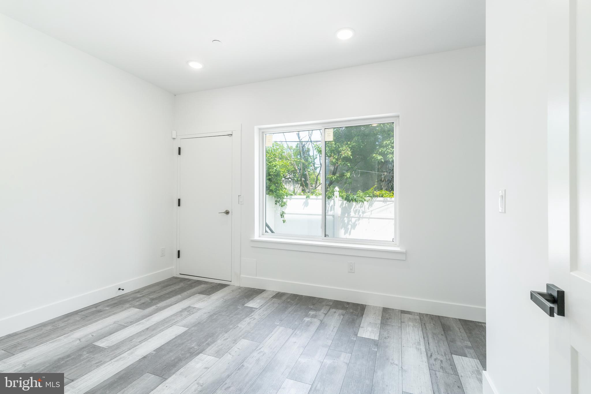 4111 Parrish Street Philadelphia, PA 19104 - Photo 9 of 38 an empty room with a window