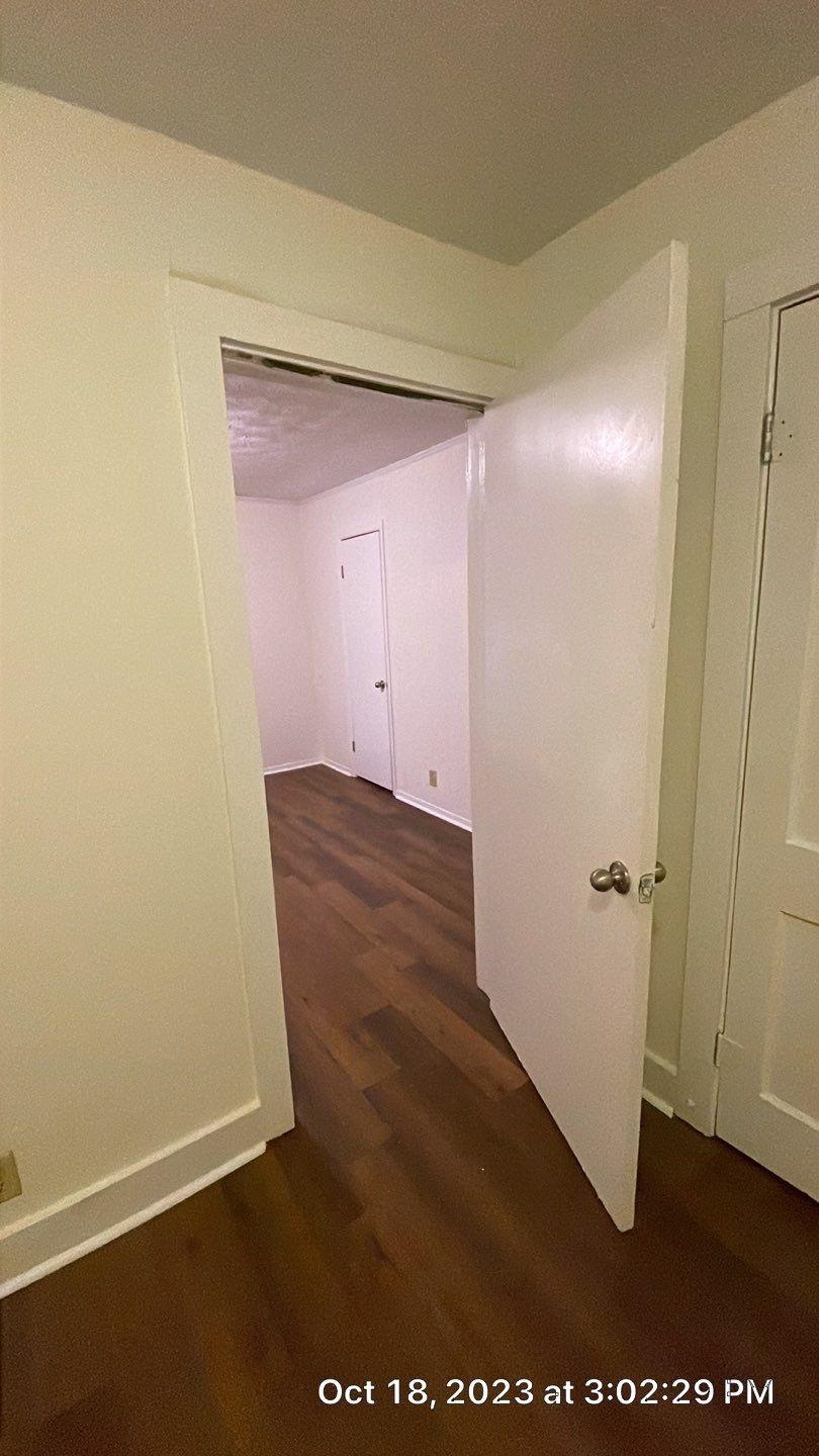 75 East Peebles Road Memphis, TN 38109 - Photo 6 of 10 an empty room with wooden floor