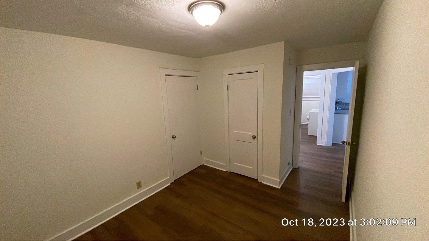 75 East Peebles Road Memphis, TN 38109 - Photo 9 of 10 an empty room with wooden floor