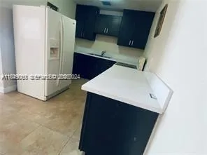 a utility room with cabinets