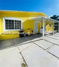 a view of a car garage with a lounge chair