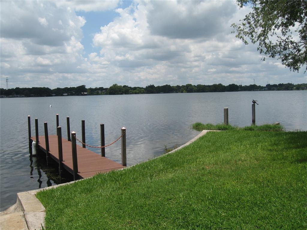 1500 Gay Road, Unit 24B Winter Park, FL 32789 - Photo 19 of 21 a view of a lake with a garden