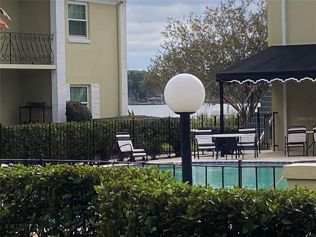 1500 Gay Road, Unit 24B Winter Park, FL 32789 - Photo 3 of 21 a view of a house with backyard and sitting area