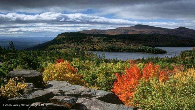 Tbd Tbd Off North Lake Road Haines Falls, NY 12436 - Photo 2 of 28 a view of a lake with a mountain