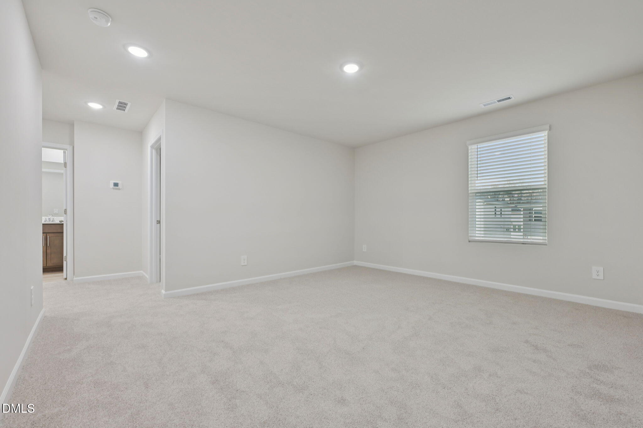 2147 Topsail Road Durham, NC 27703 - Photo 14 of 31 an empty room with a empty space and windows