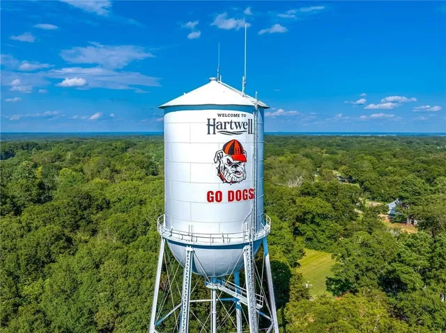 a view of a lake with a building in the background