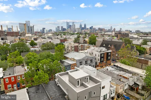 a view of a city with tall buildings