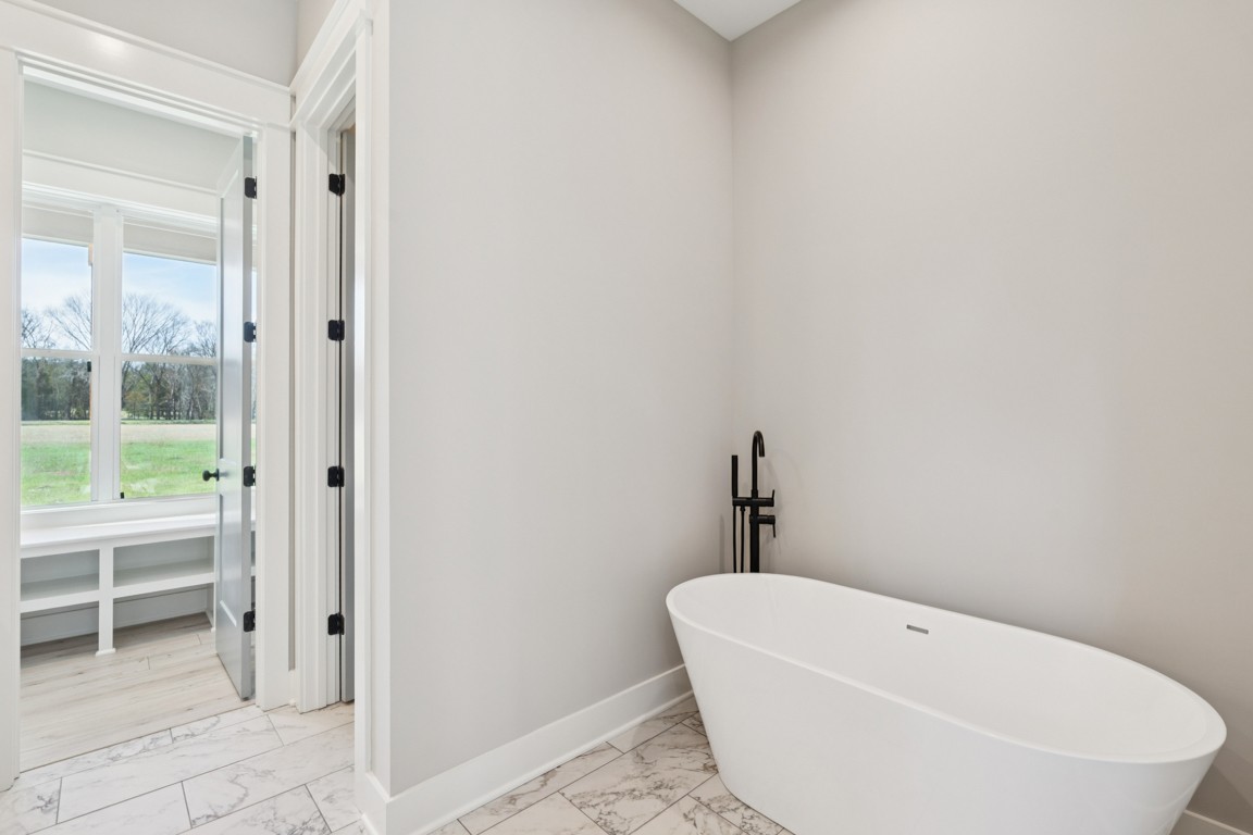 2309 Hunter Road Lewisburg, TN 37091 - Photo 14 of 27 a white bath tub sitting next to a white sink