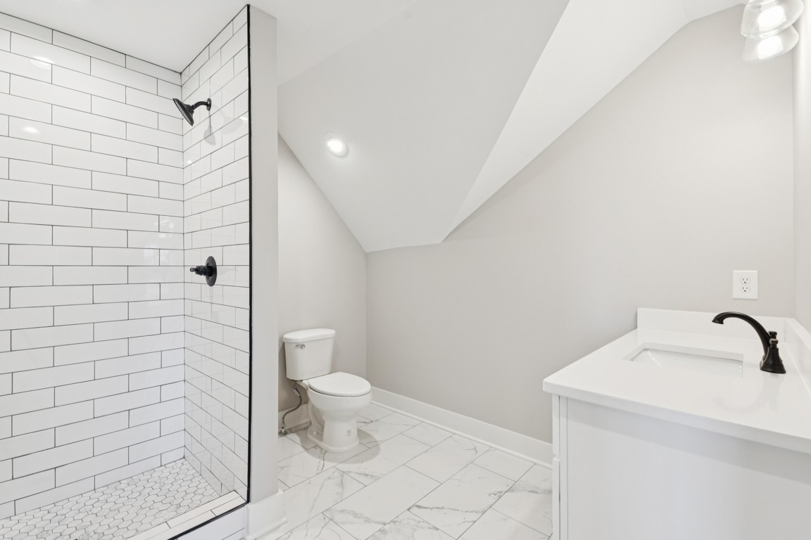 2309 Hunter Road Lewisburg, TN 37091 - Photo 20 of 27 a bathroom with a toilet a sink and shower